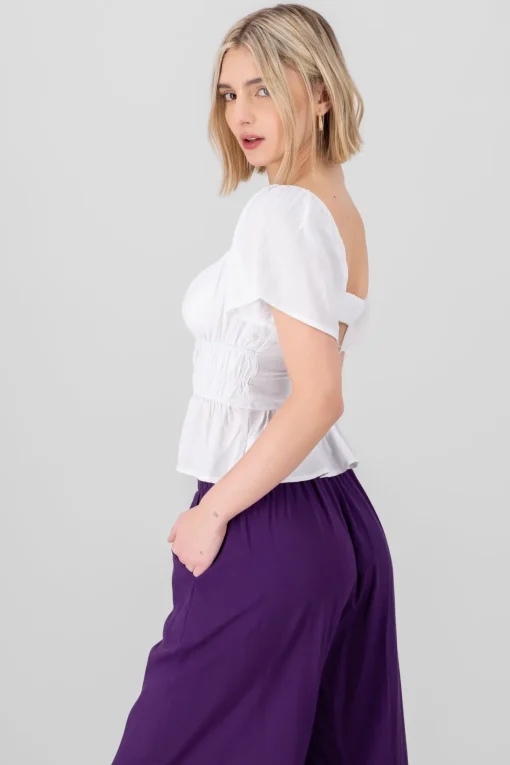 Blusa manga corta detalle espalda