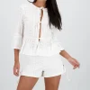 Blusa manga larga lazos detalle textura
