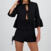 Blusa manga larga lazos detalle textura