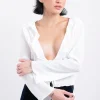 Blusa textura manga larga
