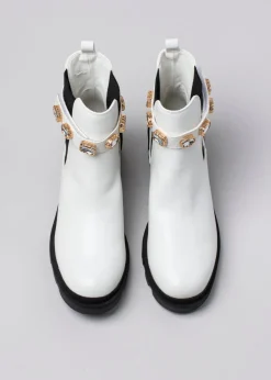 Botín suela track brillos