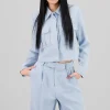 Camisa crop detalle bolsas 3D
