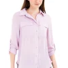 Camisa manga larga bolsos maxi