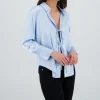 Camisa manga larga satinada detalle moños