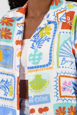 Camisa oversize manga larga detalle botones
