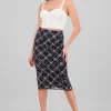 Falda maxi cuadros detalle flores