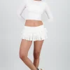 Falda short con encaje y olanes