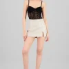 Falda short PU mini