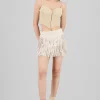 Falda suede lisa con flecos