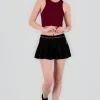 Falda tableada detalle con cadena
