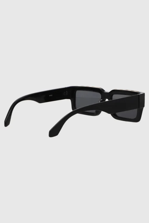 Lente wayfarer ancho traslucido