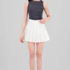 Mini falda tableada con short