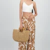 Pantalon amplio detalle resorte estampado figuras