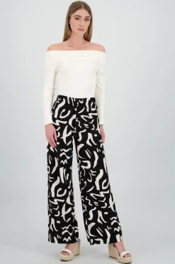 Pantalon fluido detalle estampado