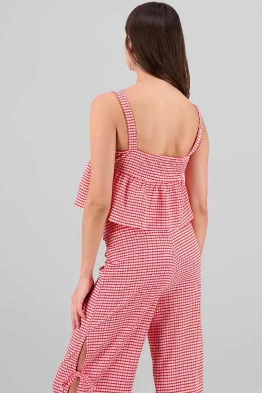 Top con olan tirantes detalle moños