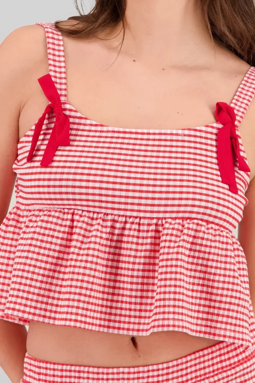 Top con olan tirantes detalle moños