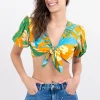 Top crop manga abullonada tropical