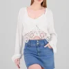 Top manga larga con crochet