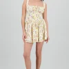 Vestido mini escote plisado flores