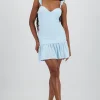 Vestido mini tela eyelet con copas