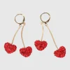 Arracadas 2 corazones glitter
