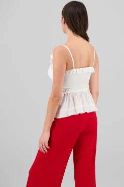 Blusa abertura moño olanes