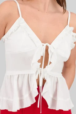 Blusa abertura moño olanes