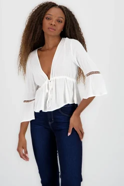 Blusa amarre detalle mangas