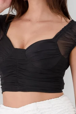 Blusa detalle plisado copas