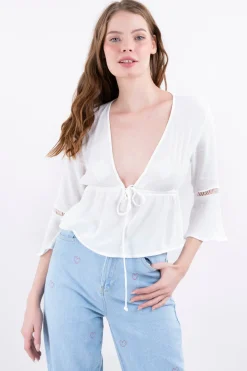 Blusa escote mangas cortes