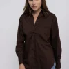 Blusa oversize elevadores