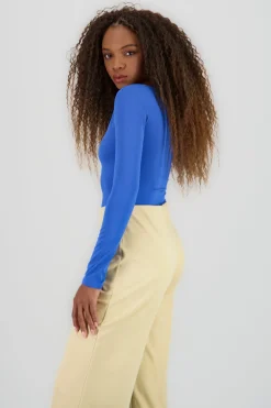 Body manga larga doble tela cuello barco