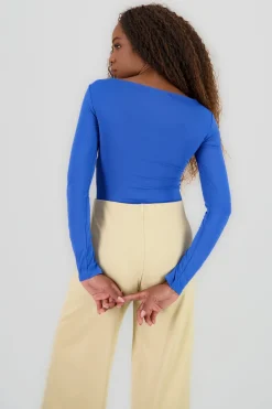 Body manga larga doble tela cuello barco