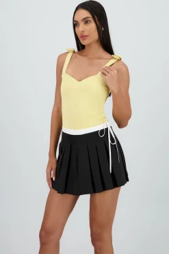 Bodysuit liso con tirante moños