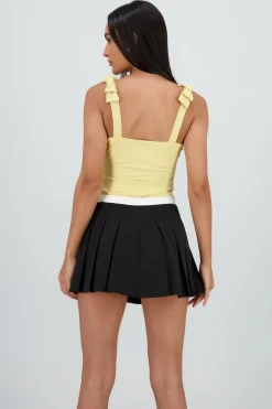 Bodysuit liso con tirante moños