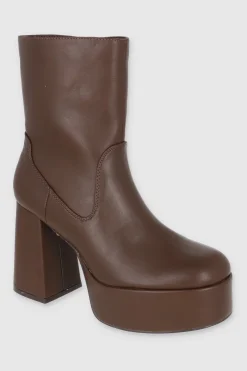 Bota plataforma desgastada