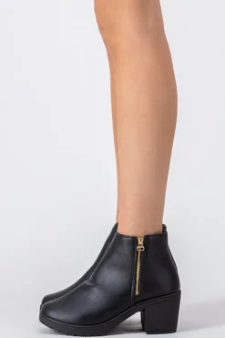 Botín cierre lateral suela track