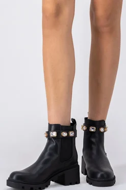 Botín suela track brillos