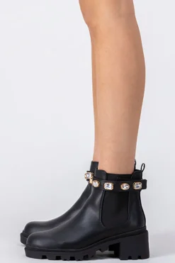 Botín suela track brillos