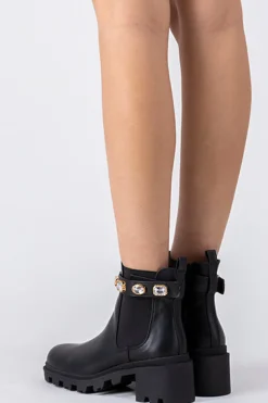 Botín suela track brillos