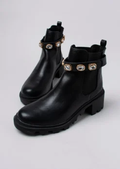 Botín suela track brillos