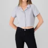 Camisa Crop Amplia Manga Corta