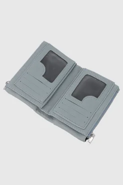 Cartera pequeña contraste texturas