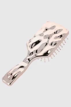 Cepillo paleta metal derretido