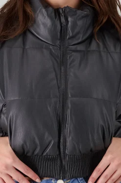 Chaleco PU capitonado con borrego