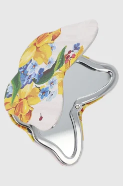 Espejo mariposa flor