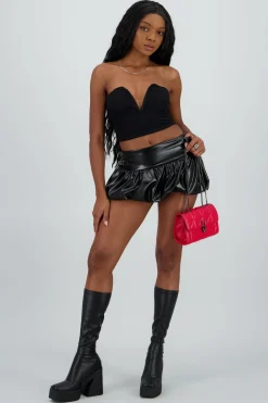 Falda mini globo PU con cinturones