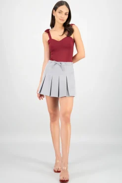 Falda mini plisada tira moño Hyps