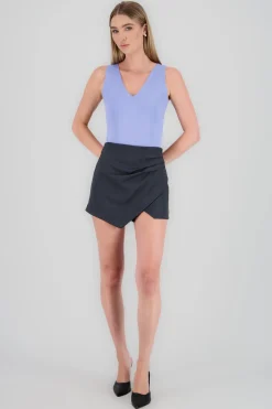 Falda short corte asimetrico pret ancha hypsters