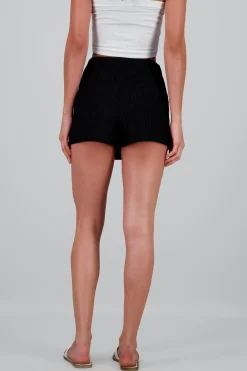 Falda short textura detalle botones